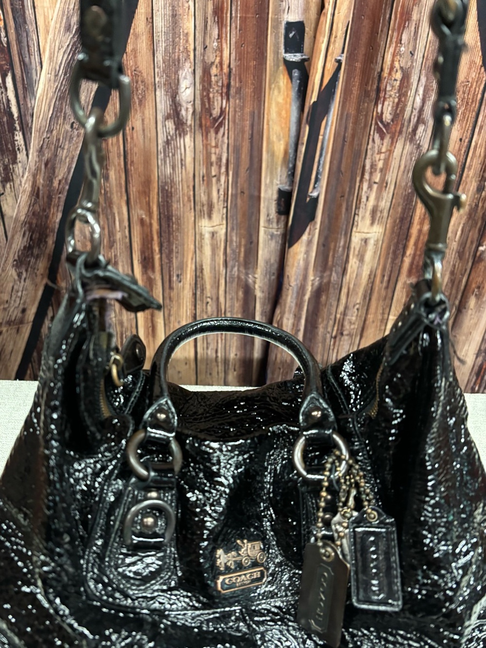 Coach Black Patent Leather Shoulder Bag with Chain-Detail Straps
F0873-12957 - Picture 2 of 7
